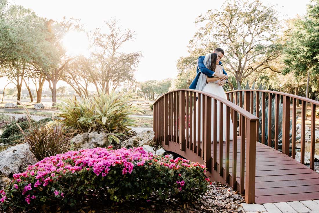 wedding couple on bridge after color correction